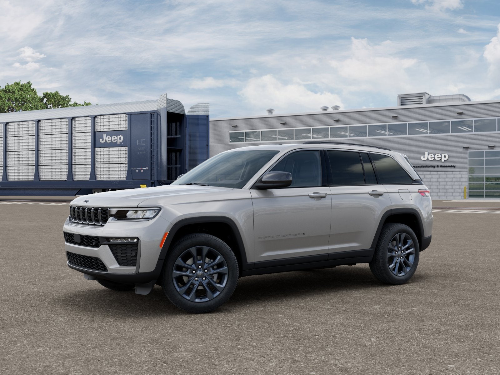 2026 Jeep Grand Cherokee GRAND CHEROKEE 85TH ANNIVERSARY EDITION 4X4 in Silver Zynith Exterior Paint — front three-quarter view